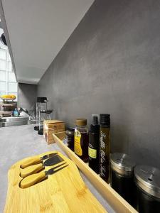 a kitchen with a counter with a cutting board and ingredients at Beautiful Apartment in Corfu in Agios Rokkos