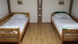 Katil atau katil-katil dalam bilik di Guest House Šebeš