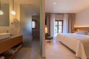 Postel nebo postele na pokoji v ubytování Nema Boutique Hotel & Spa