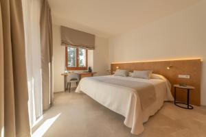 Postel nebo postele na pokoji v ubytování Nema Boutique Hotel & Spa