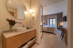 Postel nebo postele na pokoji v ubytování Nema Boutique Hotel & Spa