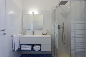 Koupelna v ubytování Milocca Homes + 10 fotografií