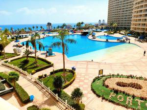 Bazén v ubytování شاليه تامر عمر في ابراج بورتو السخنة للعائلات فقط Tamer Omar's Chalet in Porto Elsokhna Towers only Family nebo v jeho okolí