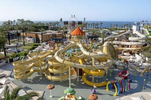 a water park with a bunch of water slides at Titanic Deluxe Lara in Lara