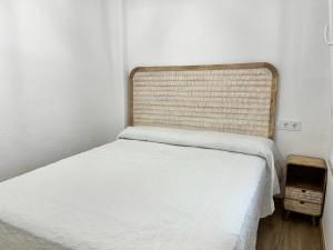 Postel nebo postele na pokoji v ubytování PEÑISCOLA Playa LES DOYES