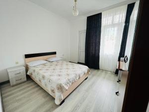 Letto o letti in una camera di Zuri Kvariati
