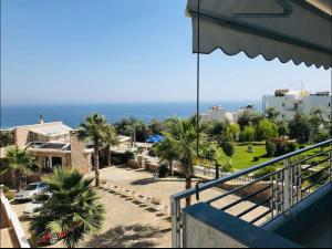 a view of the ocean from a balcony at Seaview Apartment in Dhërmi