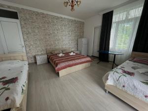Letto o letti in una camera di Zuri Kvariati