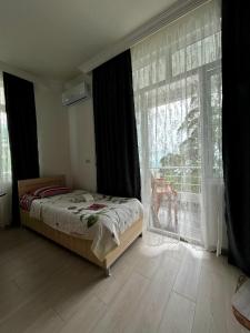 Letto o letti in una camera di Zuri Kvariati