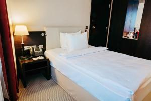 Posteľ alebo postele v izbe v ubytovaní Crowne Plaza Bratislava by IHG