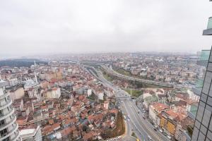 an aerial view of a city with roads and buildings at Trendy Cool Bright Studio Parking Poolviews! #254 in Istanbul
