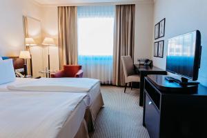 Posteľ alebo postele v izbe v ubytovaní Crowne Plaza Bratislava by IHG
