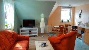 Posezení v ubytování Ferienwohnung am Dorfrand