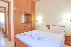 Кровать или кровати в номере Isabella Paxos Holidays +46 фотографий