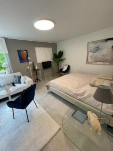 A bed or beds in a room at Gästehaus Härb