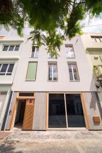 a facade of a building with large windows at The Wooden House VV in Las Palmas de Gran Canaria