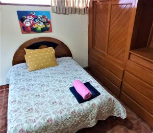 Carlos Guest House 2 Cusco客房内的一张或多张床位
