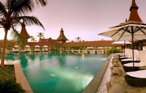 Bazén v ubytování The Lalit Resort & Spa Bekal nebo v jeho okolí