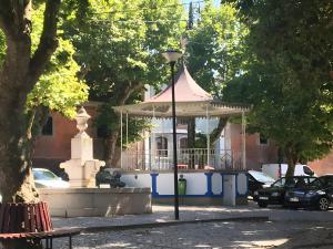 a gazebo in the middle of a park at Casa Mateus - Colares, Parque Natural Sintra Cascais in Sintra