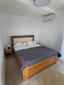 Postel nebo postele na pokoji v ubytování Kuca za odmor Anesa