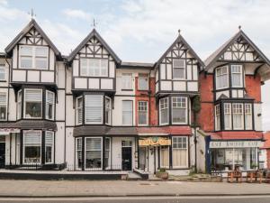 a large building with black and white windows at True North in Scarborough