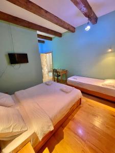 Voodi või voodid majutusasutuse Guest House Savane toas
