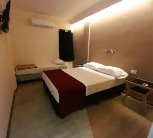 Katil atau katil-katil dalam bilik di Hotel Vanderloo