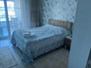 Postel nebo postele na pokoji v ubytování Eryaman, Wide Luxury Rezidance