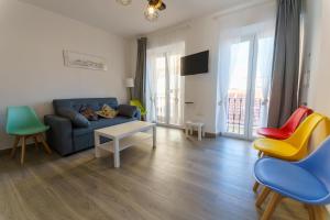 Una televisión o centro de entretenimiento en APARTAMENTOS MAPAMUNDI