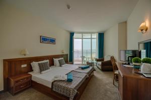 En eller flere senge i et værelse på Berlin Golden Beach Hotel - All Inclusive & Beach