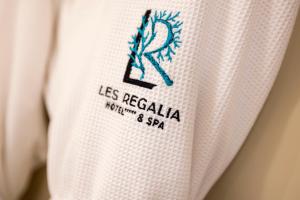 a close up of a white jersey with the la redefinedania north american at Les Regalia Hôtel & Spa in Sainte-Lucie de Porto-Vecchio