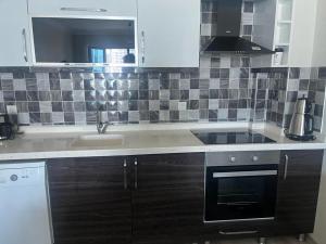 Kuchyň nebo kuchyňský kout v ubytování Eryaman, Wide Luxury Rezidance