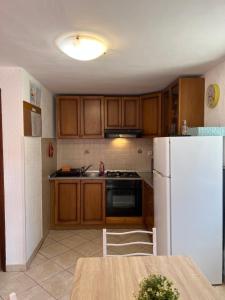 Kuchyň nebo kuchyňský kout v ubytování Apartment Ankica