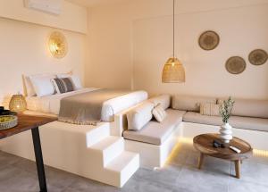Postel nebo postele na pokoji v ubytování Maeva Suites Santorini