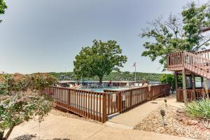 a deck with a swimming pool and a house at Osage Beach Vacation Rental with Pool and Lakeview! in Osage Beach