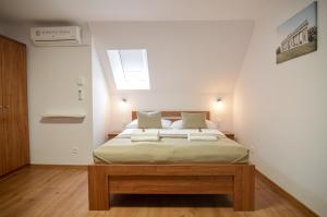 Postel nebo postele na pokoji v ubytování Residence Malva