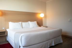 Letto o letti in una camera di Wyndham Concepcion Pettra