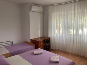 Posteľ alebo postele v izbe v ubytovaní Apartment La Mar