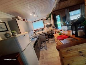 Kuchyň nebo kuchyňský kout v ubytování L'Ard'Heure D'Avance chalet familiale