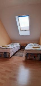 Katil atau katil-katil dalam bilik di Apartmány Lúčky 30