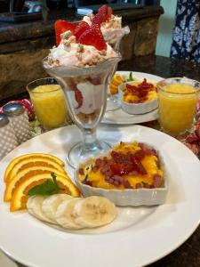 a plate of food with a dessert on a table at The Old Liberty Schoolhouse in Azle