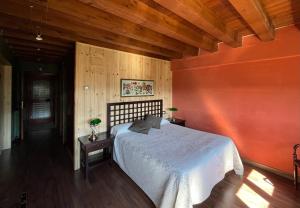 Hotel rural reina Berta客房内的一张或多张床位