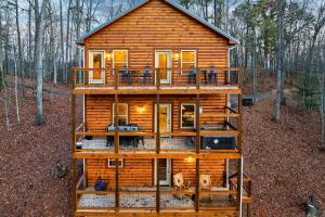 a wooden house in the middle of the woods at Entire cabin in Sevierville, Tennessee in Sevierville