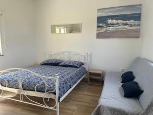 Rúm í herbergi á Apartment Stanko