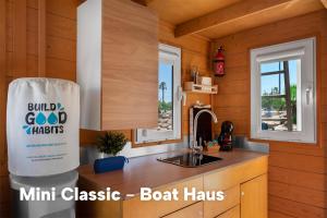 拉利内阿-德拉康塞普西翁Boat Haus - Casas Flotantes frente a Gibraltar的相册照片