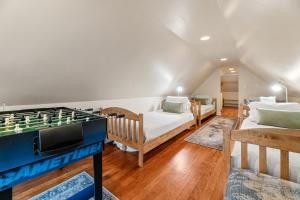 a bedroom with a bed and a chess board at Casa Luna- Beautiful Maltby style home, just a short drive from Big Bear's attractions! in Big Bear City