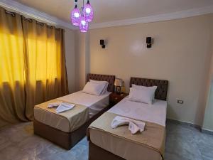 Katil atau katil-katil dalam bilik di Gem Overlooking inn