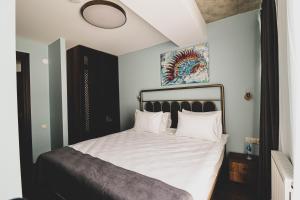 Letto o letti in una camera di Paliani Hotel