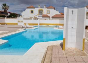 The swimming pool at or close to White Deluxe Caleta by Sea You There Fuerteventura