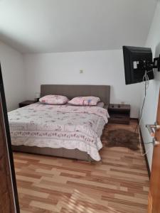 Postel nebo postele na pokoji v ubytování Apartment Lena